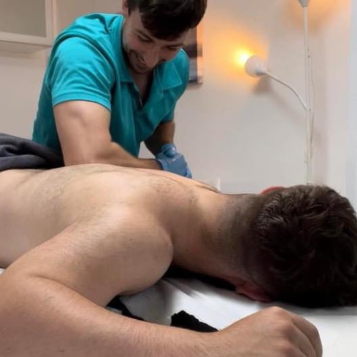 Sports injury and massage therapist Craig Macdonald gives a sports massage to a client at The Lomond Clinic, Helensburgh