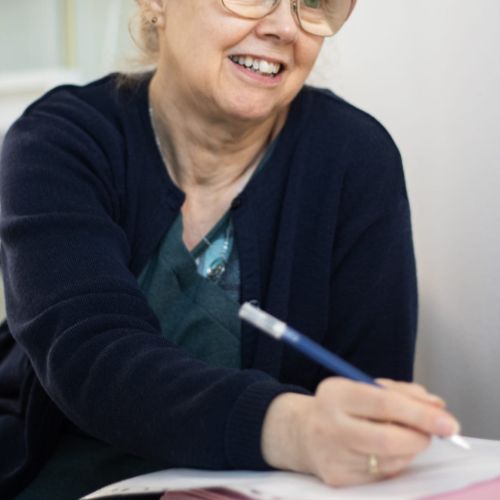 Clinical hypnotherapist takes notes at The Lomond Clinic, Helensburgh